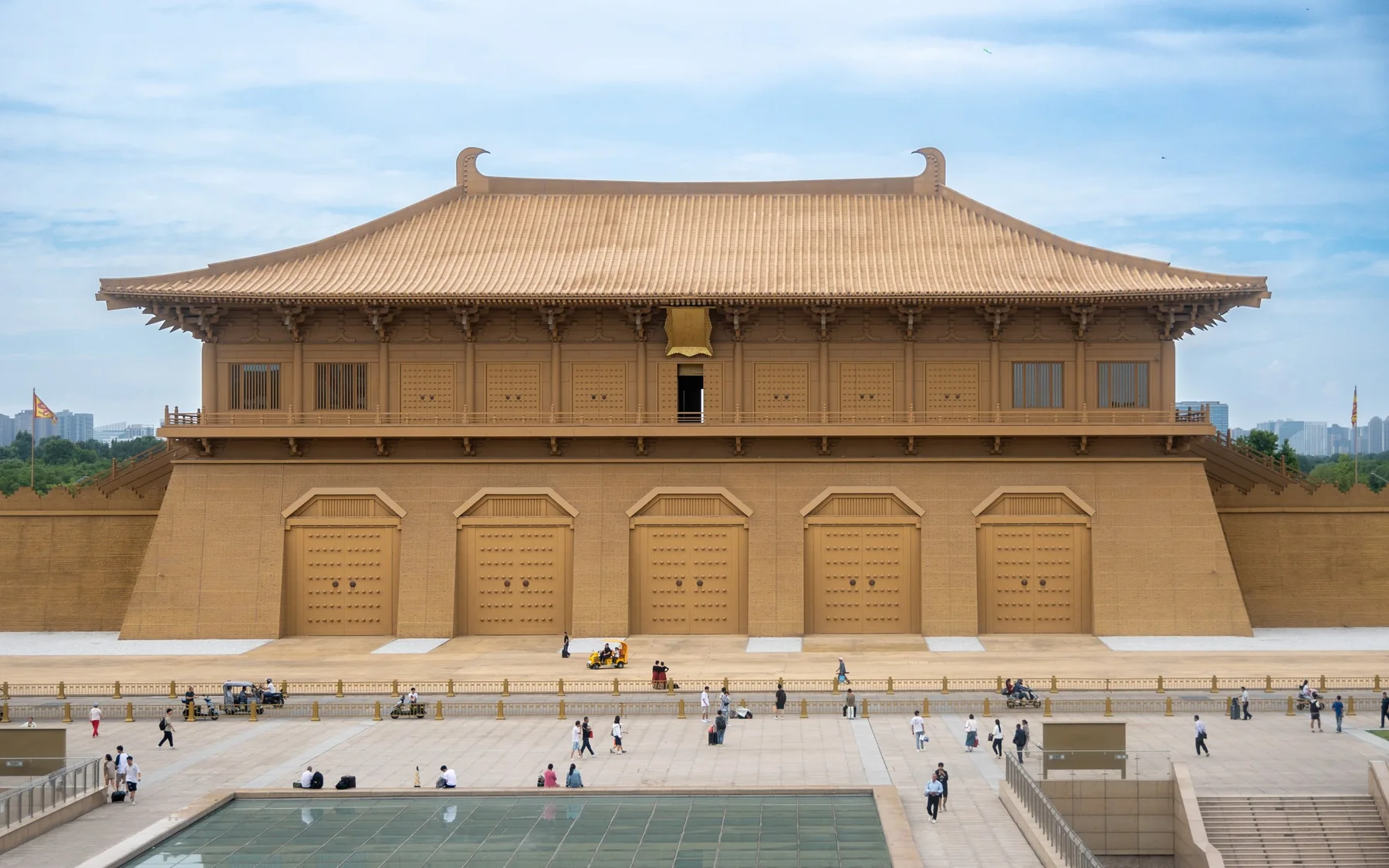 The reconstructed Danfeng Gate of Daming Palace in Xi'an, seen head-on across the heritage park plaza.