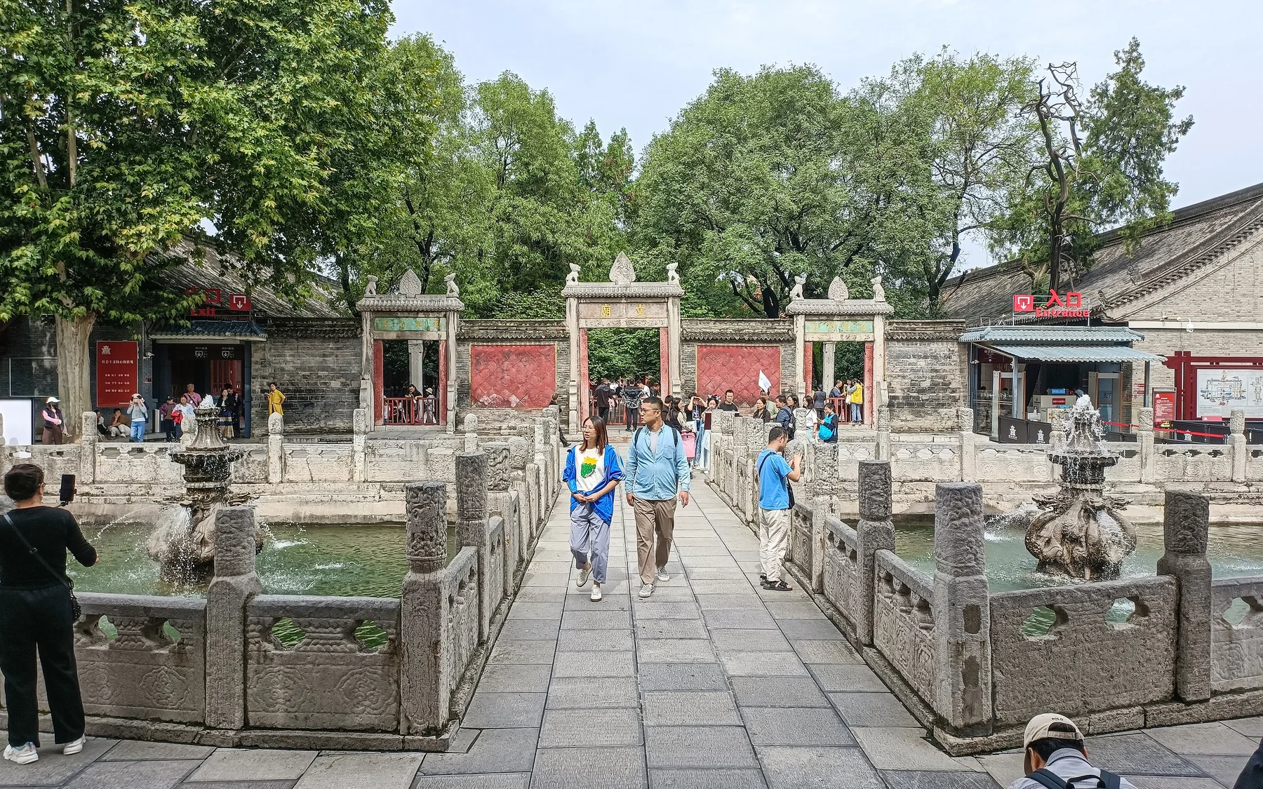 The historic Xi'an Confucian Temple axis at the Forest of Stone Steles Museum, with the stone bridge, ritual pool and Lingxing Gate aligned through the centre.