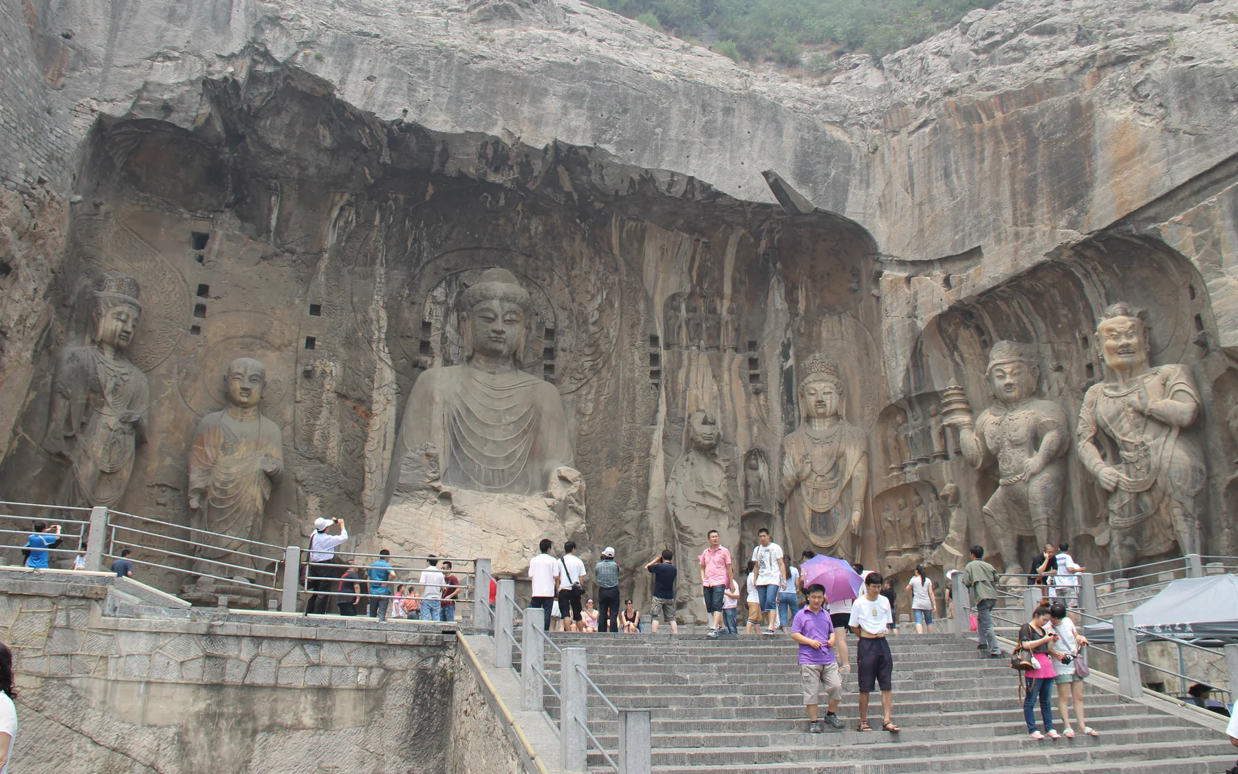 The complete Fengxian Temple niche at Longmen centred on the colossal Vairocana Buddha
