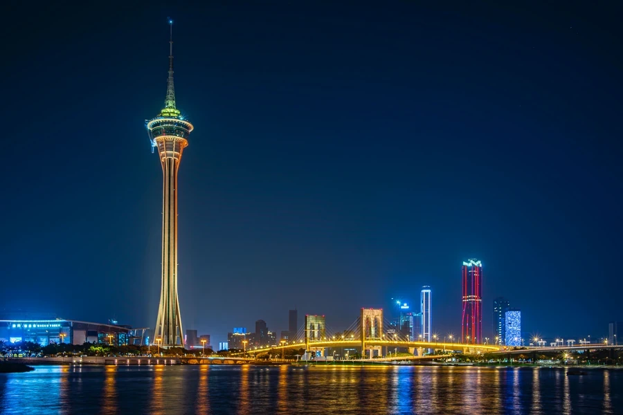 Macau Tower and the illuminated waterfront skyline