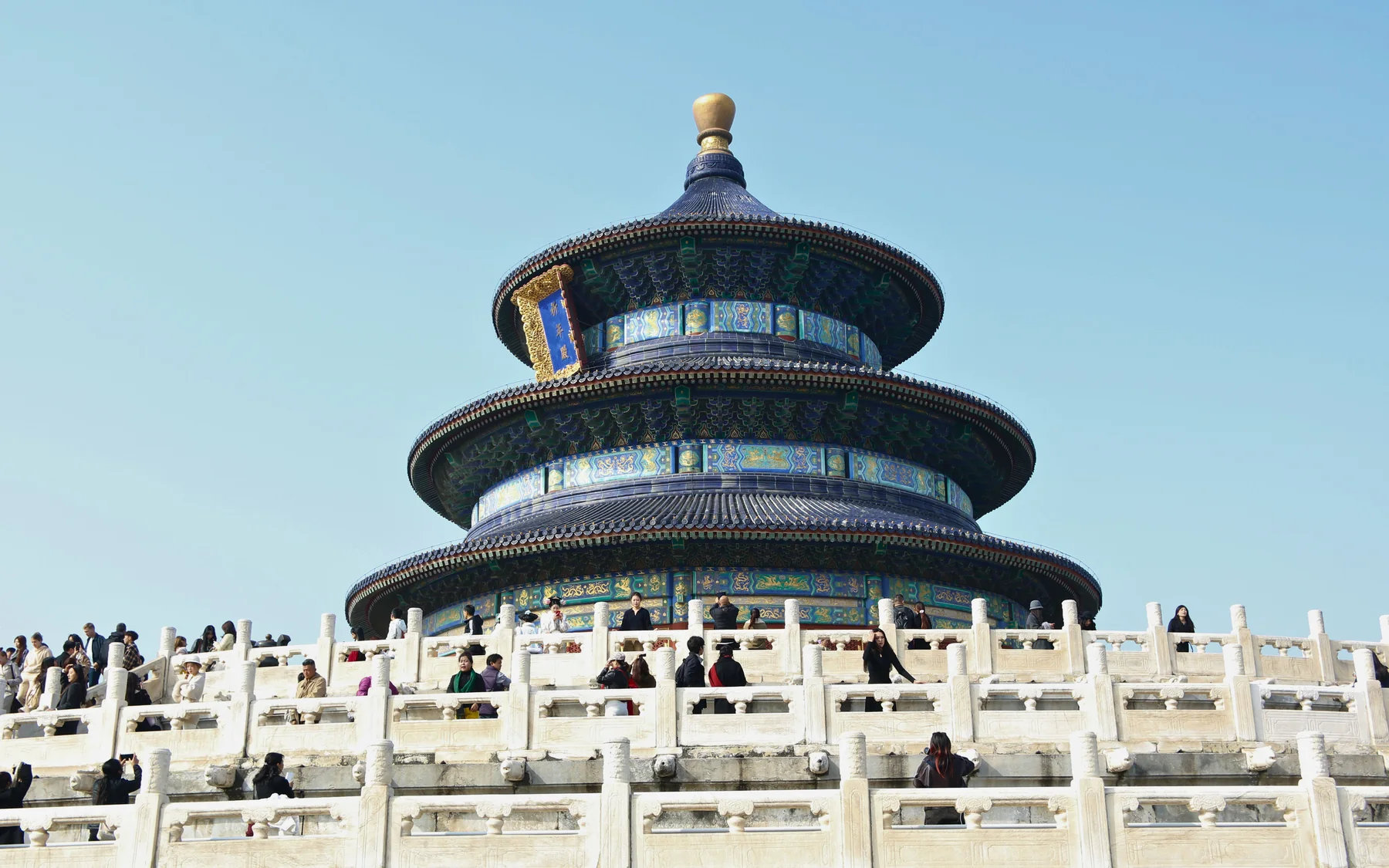 The Hall of Prayer for Good Harvests at Beijing's Temple of Heaven, centred above its white marble terraces under a clear blue sky.